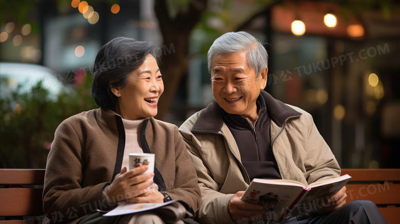在公园长椅上看书的老人摄影图
