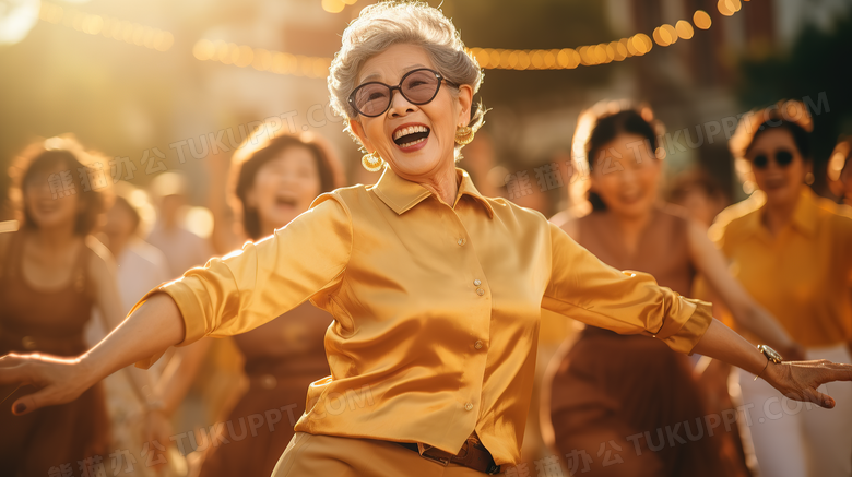 公园时尚大妈们跳广场舞摄影图