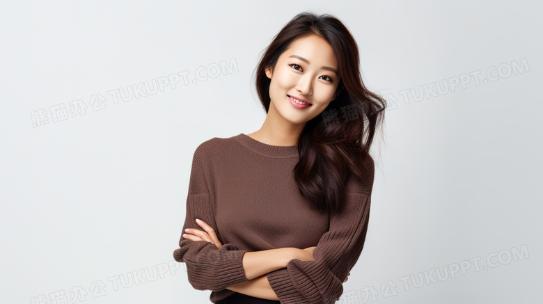 穿着棕色毛衣外套拍摄时尚大片的亚洲美女模特图片