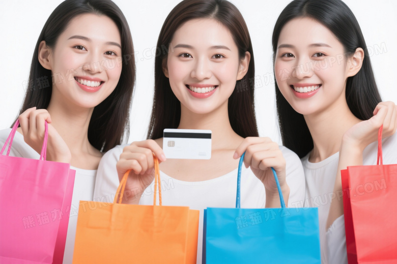 三位女性持购物袋信用卡微笑图片