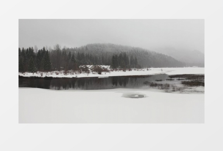 航拍湖边雪地小村庄实拍视频素材