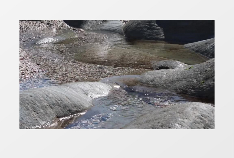 小溪边涔涔流动的水实拍视频素材